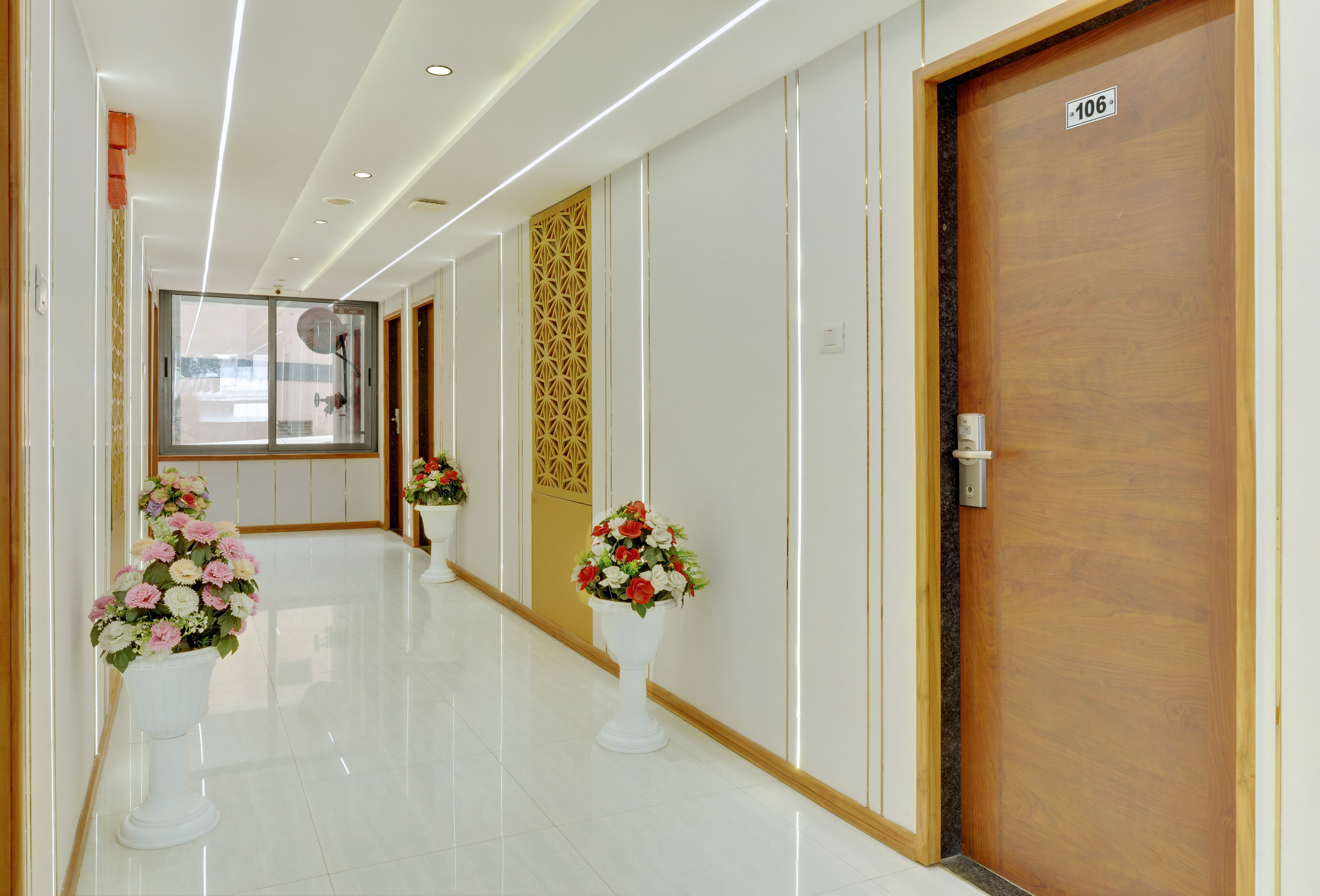Hotel Shital Inn guest room hallway with decorative doors
